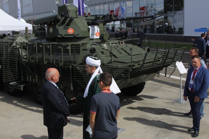 Visitors beside renewed BTR-82AT Visitors beside renewed BTR-82AT